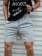 Atmungsaktive, einfarbige Badeshorts für Herren mit Kordelzug