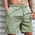 Atmungsaktive, einfarbige Badeshorts für Herren mit Kordelzug