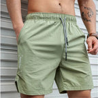 Atmungsaktive, einfarbige Badeshorts für Herren mit Kordelzug