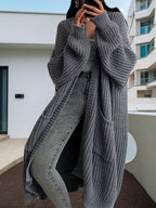 Damen Kuscheliger Strickmantel mit Gürtel und praktischen Taschen EB