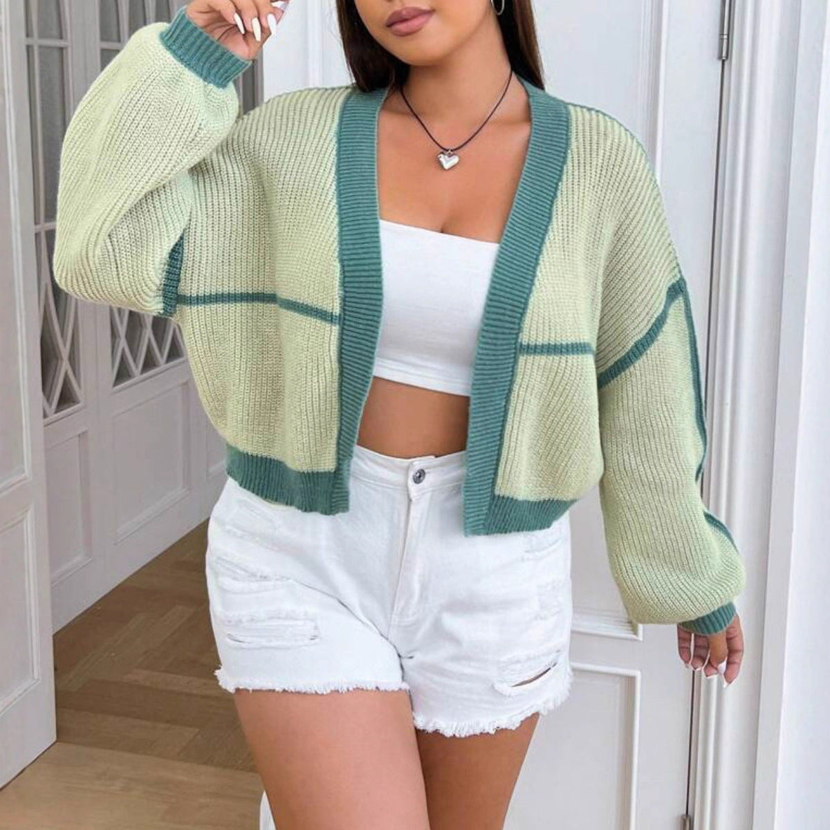 Damen Grobstrickjacke mit weit geschnittenen Ärmeln und auffälligem Design EB