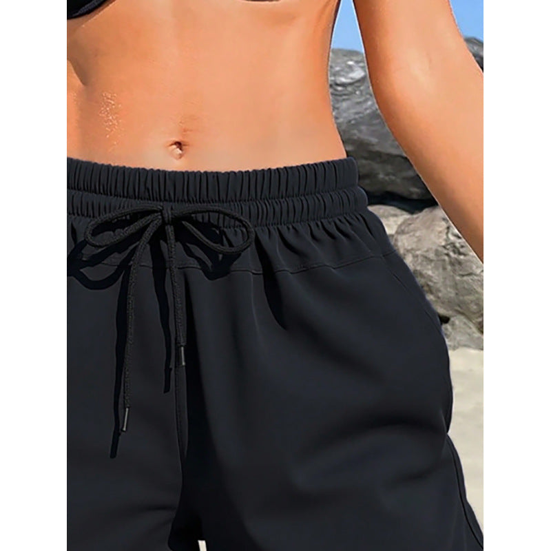 Damen Sportliche Badeshorts mit elastischem Bund und praktischen Taschen EB