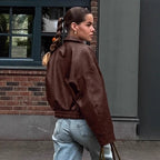 Damen Kunstlederjacke im leicht Oversized-Schnitt mit praktischen Taschen und elastischer Taille EB