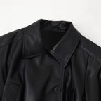 Damen Kunstlederjacke mit eleganten Knopfdetails und Gürteldesign EB