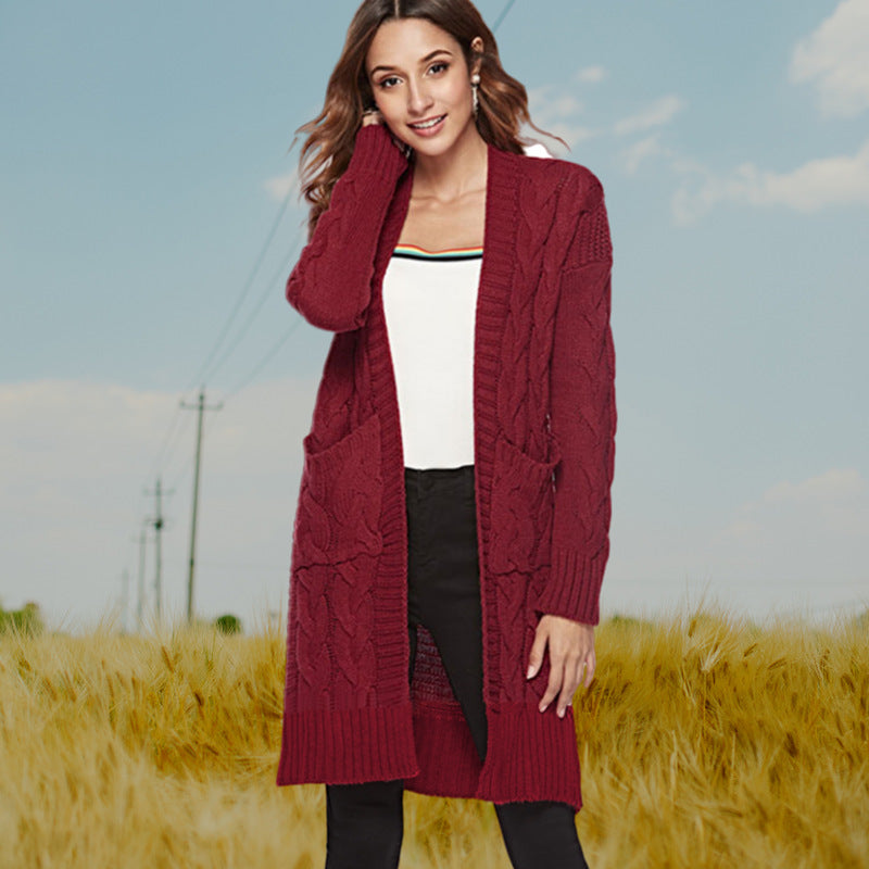 Damen Strickmantel mit voluminösen Ärmeln und praktischen Taschen EB
