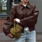 Damen Kunstlederjacke im leicht Oversized-Schnitt mit praktischen Taschen und elastischer Taille EB