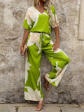 Damen Eleganter Jumpsuit mit floralen Mustern und weitem Bein EB