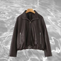 Damen Kunstlederjacke mit taillierbarem Gürtel und seitlichen Reißverschlusstaschen EB