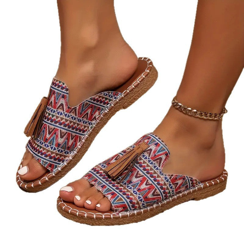 Damen Bequeme Zehensteg-Pantoletten mit buntem Muster und eleganter Quaste EB