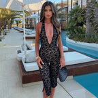 Damen Eleganter Spitzen-Jumpsuit mit tiefem V-Ausschnitt und seitlichen Schlitzen EB