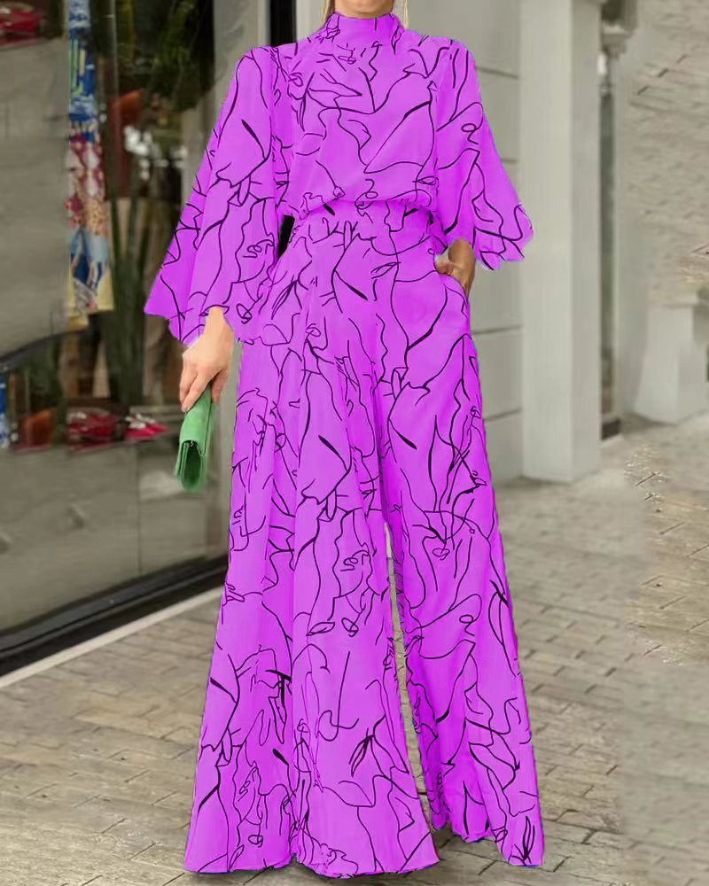 Eleganter Jumpsuit mit Stehkragen und Ballonärmeln