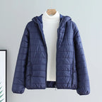 Damen gesteppte Übergangsjacke mit Kapuze und modernem Schnitt EB