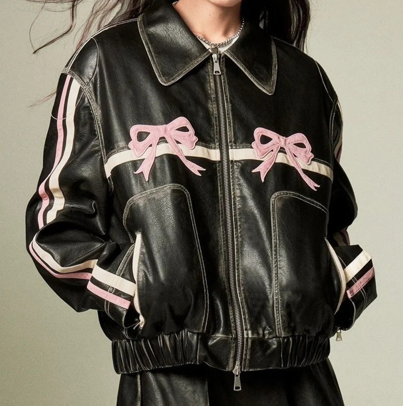 Damen Kunstlederjacke mit Rüschen und elastischem Saum EB