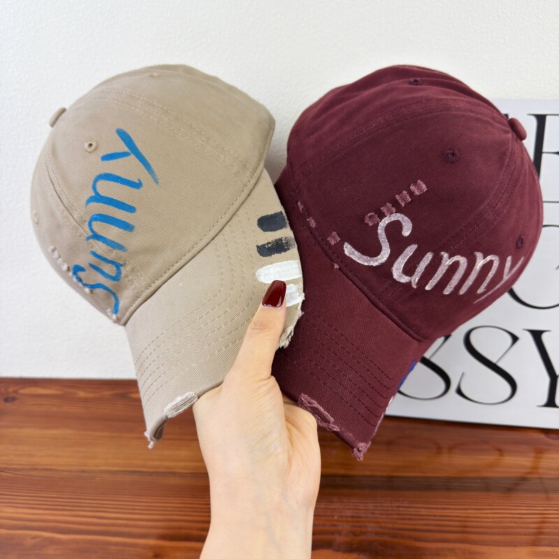 Damen-Baseballkappe mit Grafik im Used-Look
