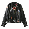 Damen kunstleder Bikerjacke mit floralem Stickdesign und Nietenverzierungen EB
