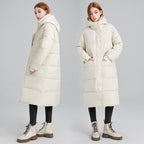Damen Lange isolierte Winterjacke mit Kapuze und einzippbarem Kragen EB