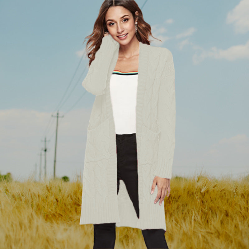 Damen Strickmantel mit voluminösen Ärmeln und praktischen Taschen EB