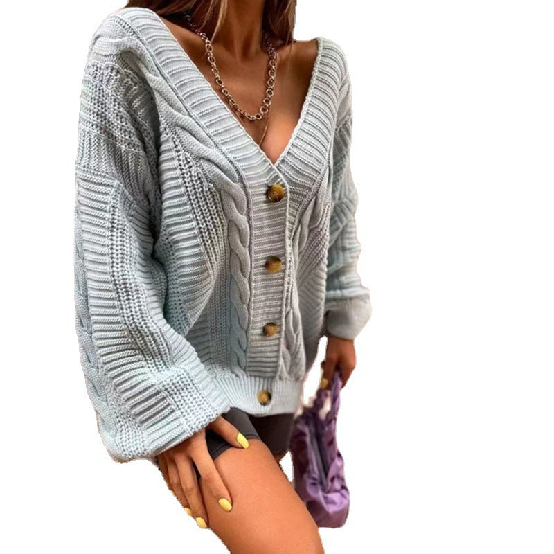 Damen Grobstrickjacke mit voluminösen Ärmeln und Knopfdetails EB