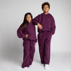 Damen lässiger Fleece-Jumpsuit mit geräumiger Kapuze und praktischen Taschen EB