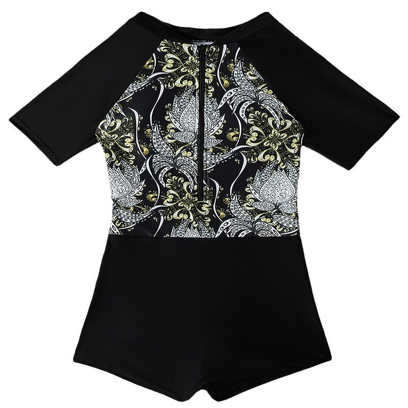 Damen Sporteinteiler mit floralem Design und kurzem Arm EB