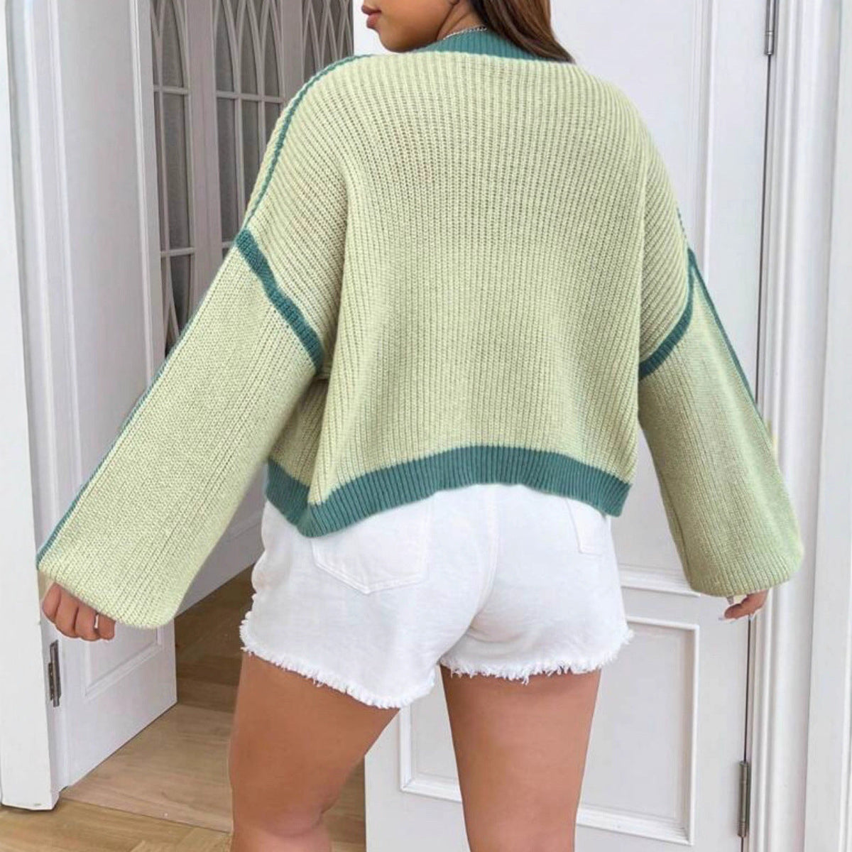Damen Grobstrickjacke mit weit geschnittenen Ärmeln und auffälligem Design EB