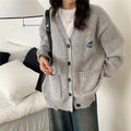 Damen Grober Strickcardigan mit praktischen Taschen und Knopfdetails EB