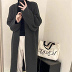 Damen Langer Wollmantel im minimalistischen Stil mit weitem Schnitt und eleganten Details EB
