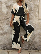 Damen Eleganter Jumpsuit mit floralen Mustern und weitem Bein EB