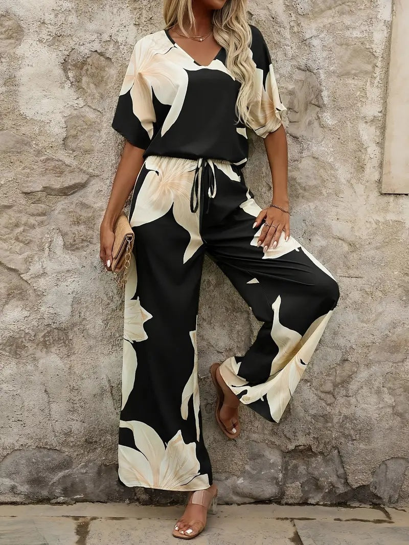 Damen Eleganter Jumpsuit mit floralen Mustern und weitem Bein EB