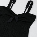 Eleganter, hochgeschnittener Einteiler mit Rüschendetails