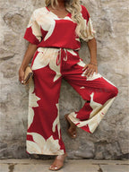Damen Eleganter Jumpsuit mit floralen Mustern und weitem Bein EB
