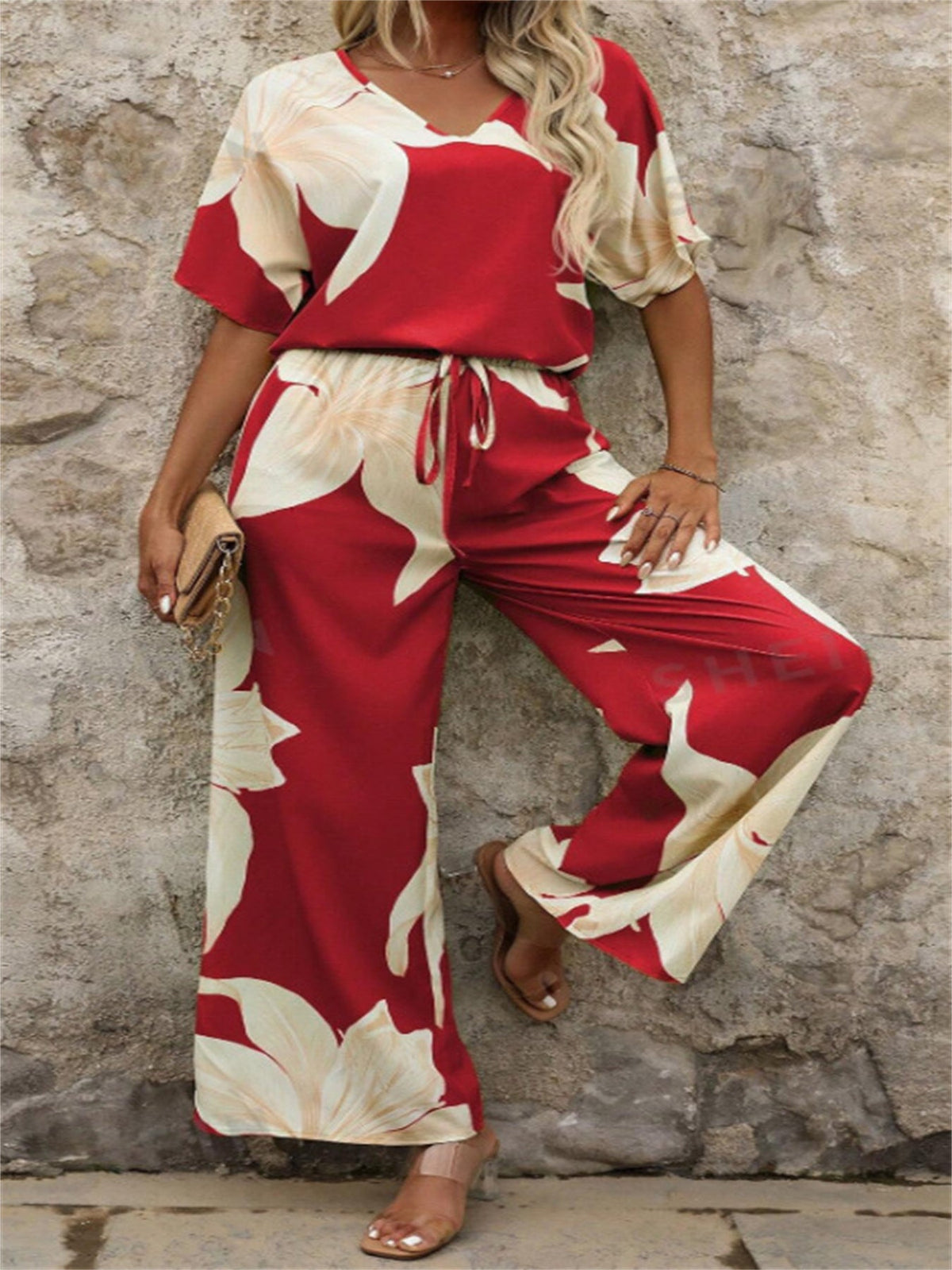 Damen Eleganter Jumpsuit mit floralen Mustern und weitem Bein EB