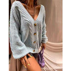 Damen Grobstrickjacke mit voluminösen Ärmeln und Knopfdetails EB