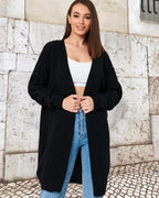 Damen Grobstrickmantel mit eleganten Zopfdetails und lässigem Schnitt EB