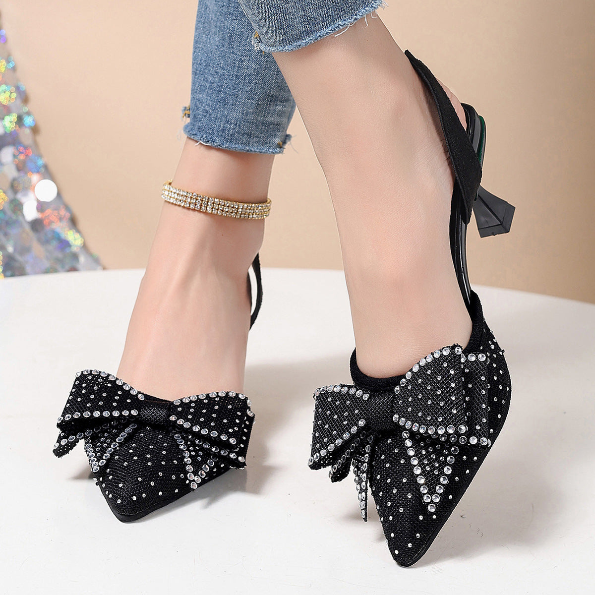 Damen Slingback-Pumps mit schimmernden Strassverzierungen und eleganter Schleifenoptik EB