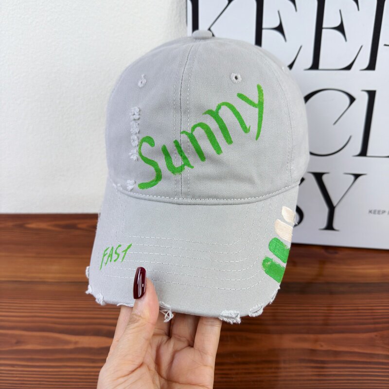 Damen-Baseballkappe mit Grafik im Used-Look