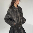 Damen Kunstlederjacke mit Rüschen und elastischem Saum EB