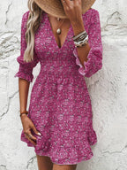 Damen Blumenkleid mit V-Ausschnitt und Puffärmeln EB