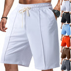 Kniekurze, entspannte Bermuda-Shorts für Herren mit Bügelfalte, elastischem Bund und Seitentaschen