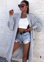 Damen Langer Strickmantel mit oversized Ärmeln und praktischen Taschen EB