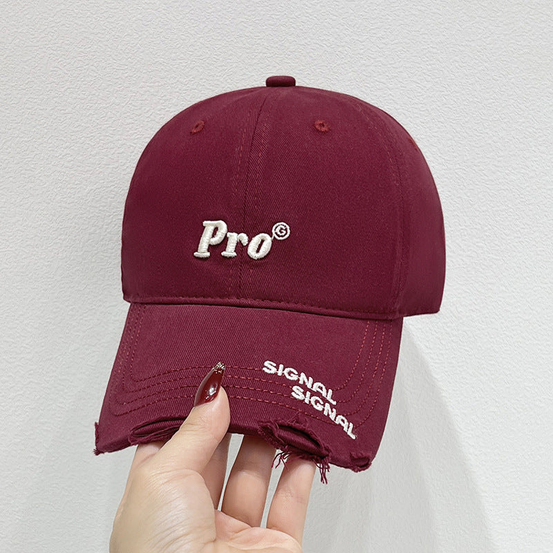Damen Baseballcap im Distressed-Look