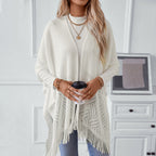 Damen eleganter Strickponcho mit fransigen Details und markantem Muster EB