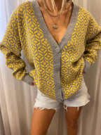Damen Grober Strickjacke mit V-Ausschnitt und auffälligem Muster EB