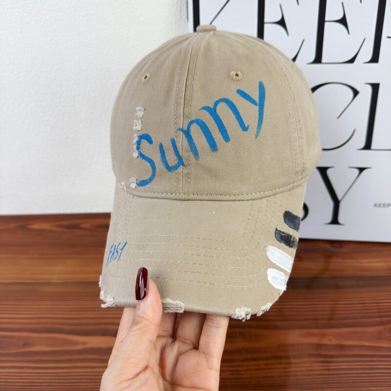 Damen-Baseballkappe mit Grafik im Used-Look
