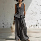 Damen lässiger Jumpsuit mit peplum Schnitt und Knopfdetails EB