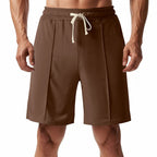Kniekurze, entspannte Bermuda-Shorts für Herren mit Bügelfalte, elastischem Bund und Seitentaschen