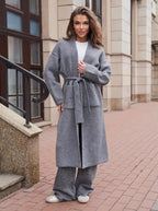 Damen Strickmantel mit Gürtel und praktischen Taschen EB