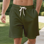 Herren nan gerippte Jersey-Shorts mit elastischem Bund, dekorativem Kordelzug und seitlichen Eingrifftaschen EB