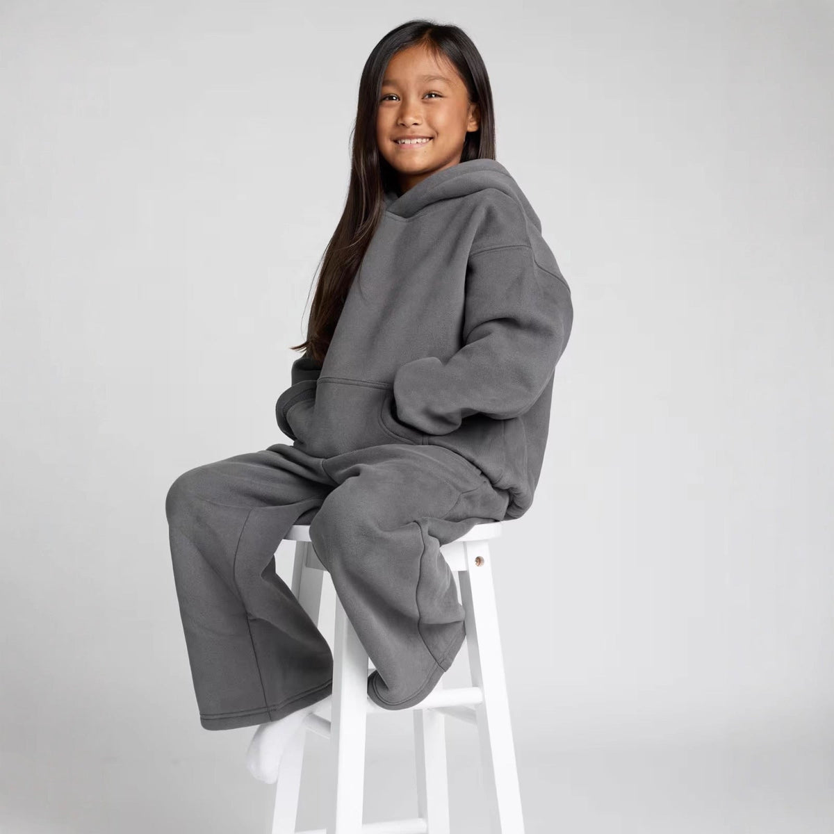 Damen lässiger Fleece-Jumpsuit mit geräumiger Kapuze und praktischen Taschen EB