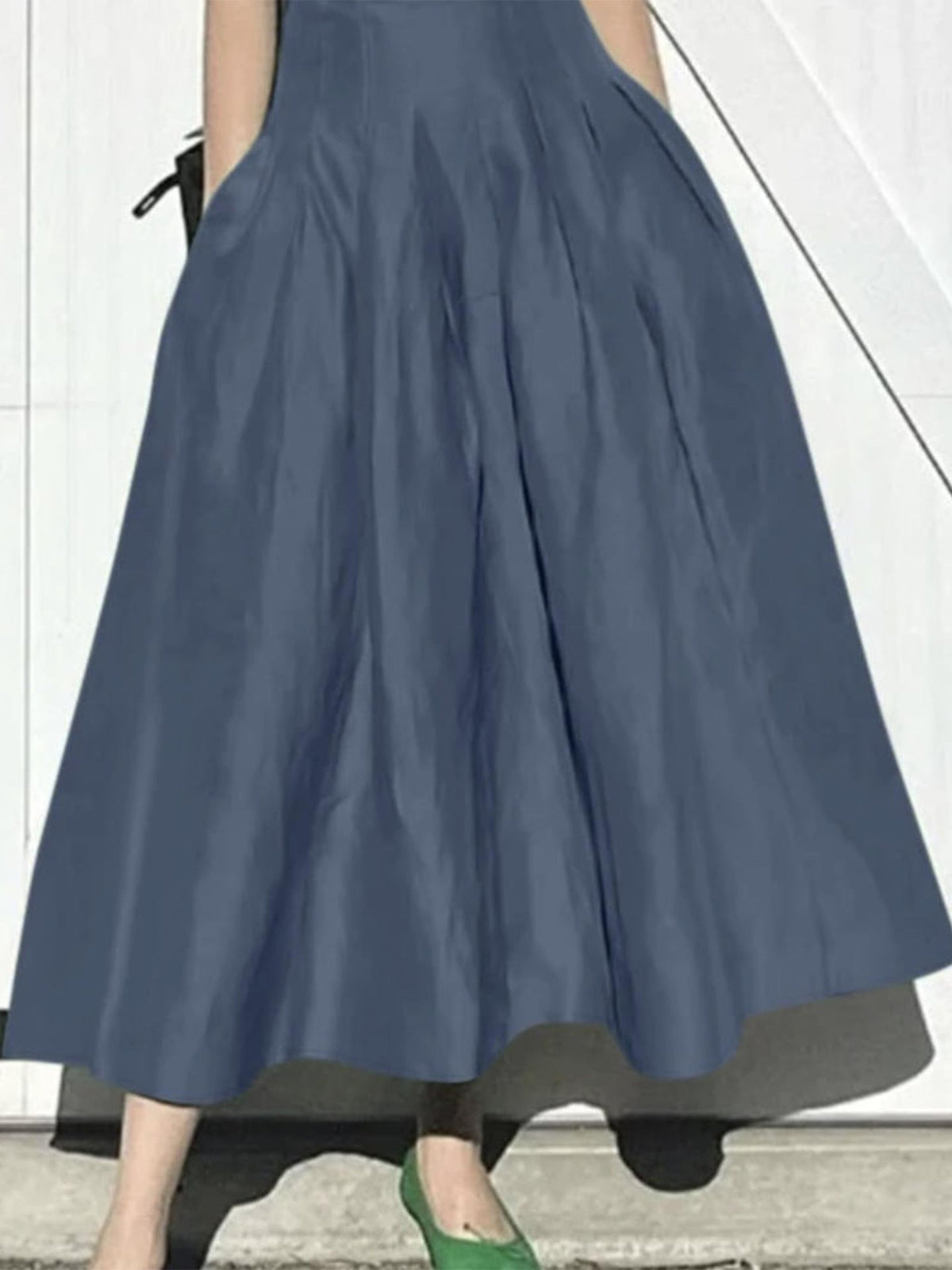 Damen Eleganter Midirock mit fließendem Schnitt und seitlichen Taschen EB